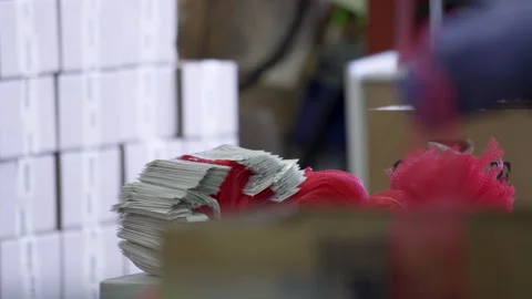 Rack focus of gloved hands bagging potatoes for a donation food bank Video stock 130994076
