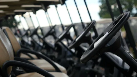 Rack Focus Golf Carts lined up [4K HD] Stock-Footage 91754241