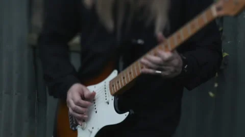 Rack focus of a guitar player Video stock 57128921