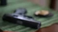 rack focus gun and badge HD Footage