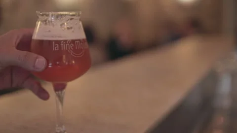 Rack Focus Hand Grabbing Beer Glass Parisian Pub Stock Footage 346394512