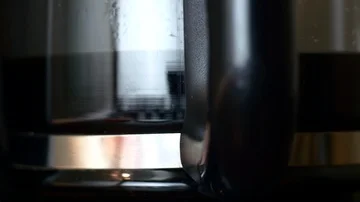 Rack Focus From The Handle To The Pot Of A Coffee Maker, Detail Stock Footage 85555974