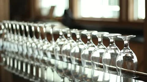 Rack Focus Line of Glasses on Bar Top Stock Footage 11874480