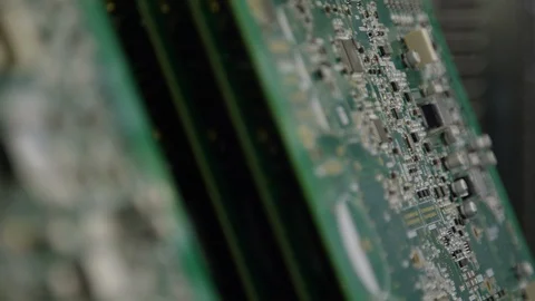 Rack focus macro across circuit boards Stock Footage 89673530