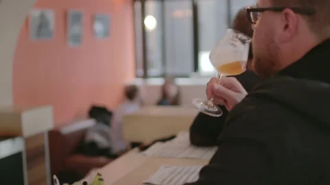 Rack Focus Man Drinking Craft Beer Bar Stock Footage 344303209