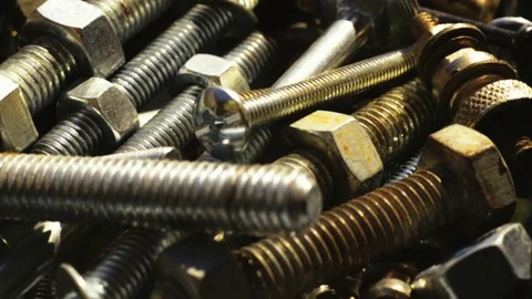 Rack focus on nuts and bolts Stock Footage 77659614