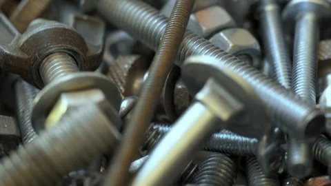 Rack focus on nuts and bolts Stock Footage 77659626
