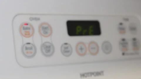 Rack Focus to Oven Preheating Video stock 50381098