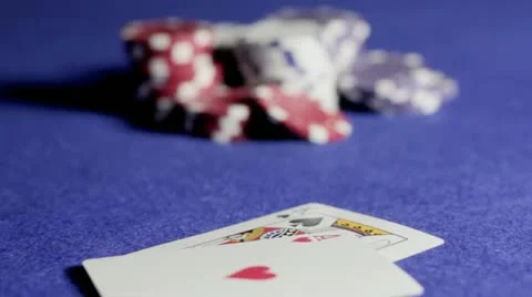 Rack focus from Pair of cards to gambling chips Video stock 11161134