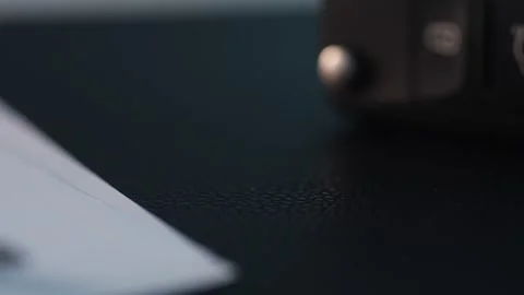 Rack focus from Pen and Paper Documents to Car Key. Stock Footage 267276852