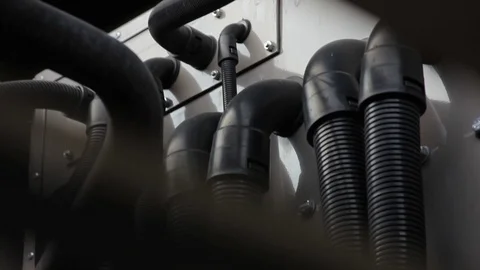 Rack Focus to Pipes and Tubes on Industrial HVAC Equipment, handheld camera Video stock 94912664