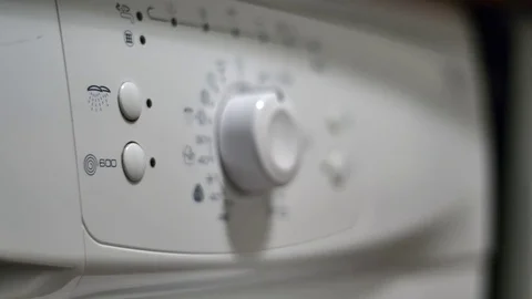 Rack Focus On The Programing Area Of A Washing Machine, Household Appliance Video stock 70165598