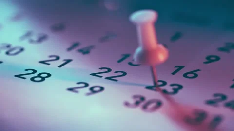 Rack focus of Push pin on a calendar Stock-Footage 49162685