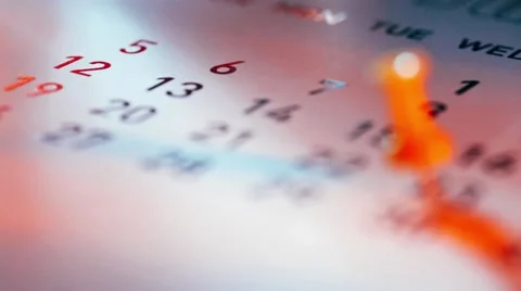 Rack focus of Push pin on a calendar Stock Footage 49326337