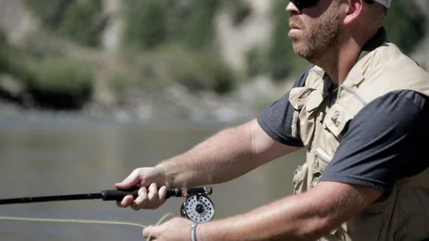 Rack Focus River and Mountain to Fly Fisherman 스톡 동영상 99798463