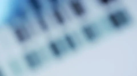 Rack focus to scientist comparing DNA profiles, 4K, UHD Stock-Footage 49170586