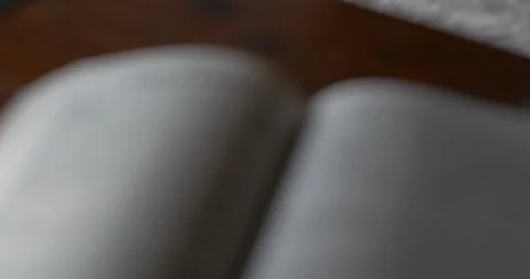 Rack Focus of Scripture John 3:16 in the Bible Stock-Footage 106576872