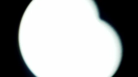 Rack focus shoot solar eclipse in the Dubai desert. almost anular phase, Stock Footage 135710804