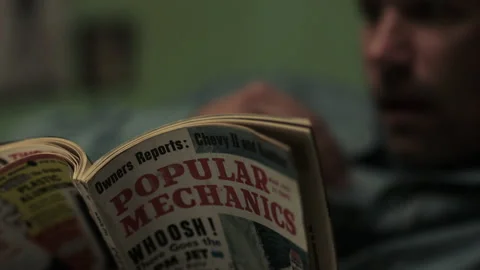 Rack focus shot of an inmate planning a prison escape, USA, 1960s - Reenactment Stock Footage 238866720