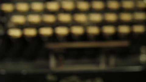 Rack Focus Shot of Old Yellow Typewriter Keys Stock Footage 112949033