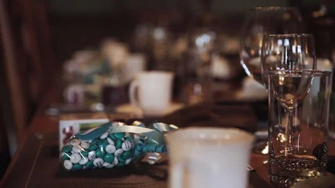 Rack focus shot over an empty diner table with cutlery and bonbons getting Stock Footage 99852638