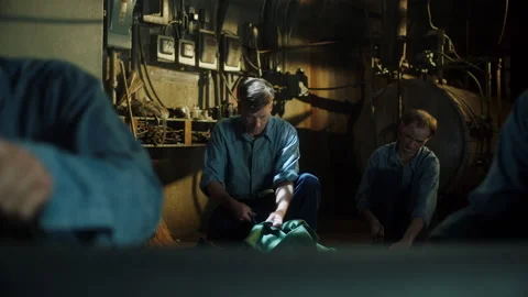 Rack focus shot of prison interior and inmates at work, USA, 1960s - Reenactment 스톡 동영상 238866731