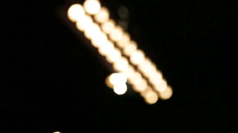 A rack-focus shot of white stage lights Stock Footage 61618339