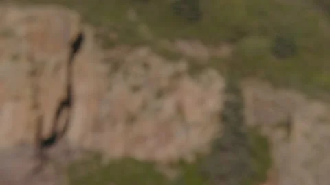 Rack Focus to on the side of Mountain Stock Footage 204869195