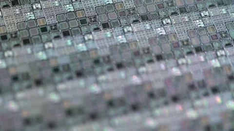 Rack focus of a silicon wafer microchips 4k Stock Footage 61719245