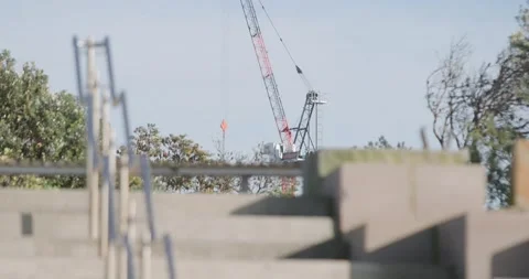 Rack Focus from stairway to crane Stock Footage 197737698