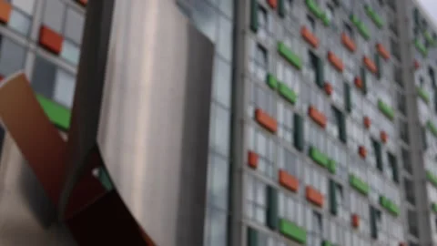 Rack focus on statue in front of Oberhausen building Stock Footage 340149829