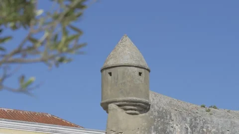 Rack focus to stone sentry box turret at Cascais fortress Portugal Stock Footage 345675569