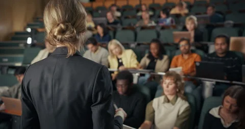 Rack Focus University Class Lecturer and Students Stock Footage 326419021
