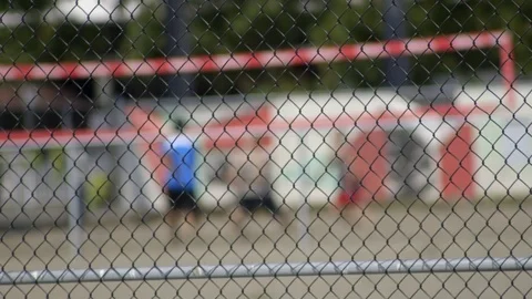 Rack focus: Voleyball trough a cell Stock Footage 81133074