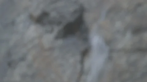 Rack Focus Water Trailing Down Granite Yosemite National Park Stock Footage 122400552