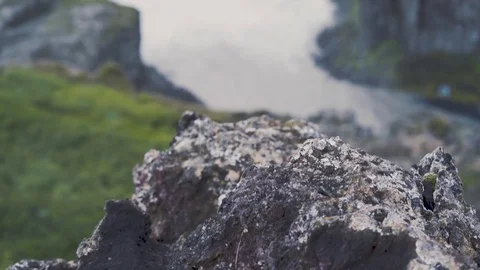 Rack Focus on a Waterfall in Iceland Stock Footage 78875237