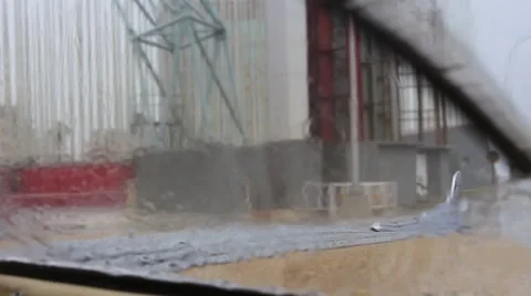 Rack Focus Windshield Wipers in Rain Cuba Stock Footage 62937791