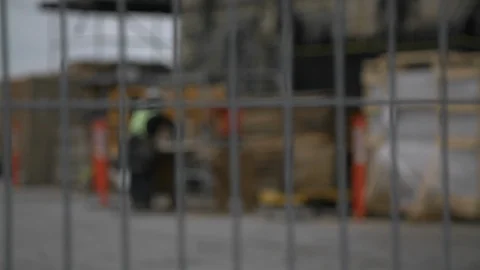 Rack focus to workers construction on parliament Stock Footage 90682166