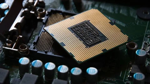 Rack focusing on the computer processor on electronic motherboard. Stock Footage 202131975