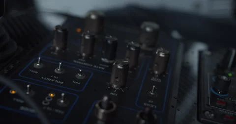 Rack focusing of control panel. Rows of knobs and switches for setting up and 스톡 동영상 249700681