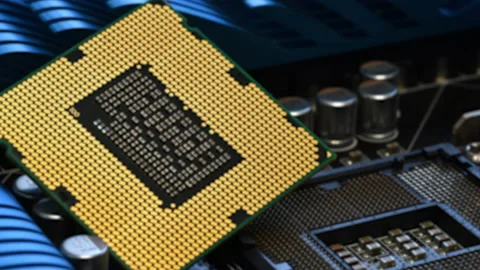Rack focusing on CPU Processor over PC Motherboard Stock Footage 161011884