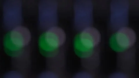 Rack focusing flashing green computer and networking lights in an IT rack Video stock 131629489