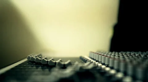 The rack focusing of the mixer faders. Stock Footage 34380900
