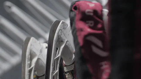 Rack for ice skates in locker room of hockey arenas Stock Footage 252531426