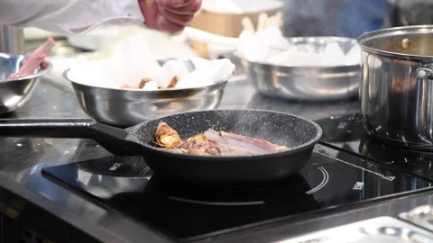 Rack of lamb on frying pan Stock Footage 253595601