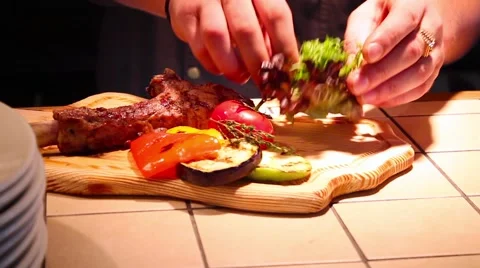 Rack of lamb with vegetables Stock-Footage 65743321