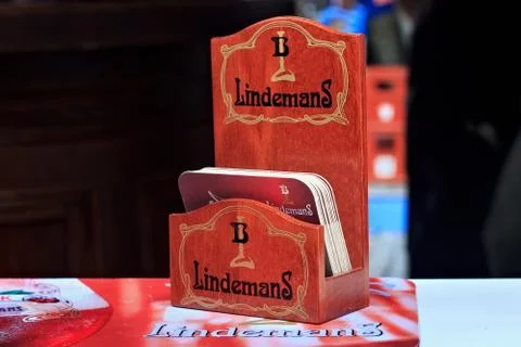 Rack with a pack of beer drink coasters of Lindemans brewery Stock Photos