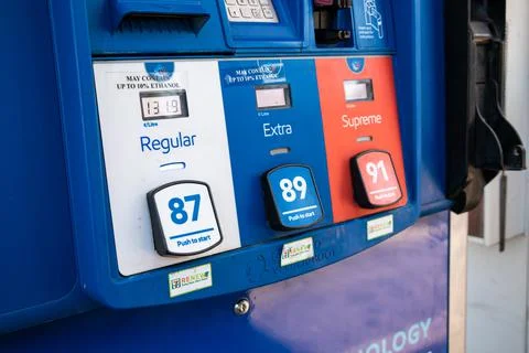 A rack with pumps with different types of fuel at  Esso Gas Station. Stock Photos
