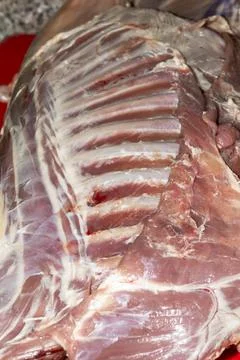 A rack of raw lamb ribs ready for cooking Stock Photos