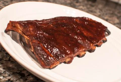 Rack of ribs on a plate Stock Photos